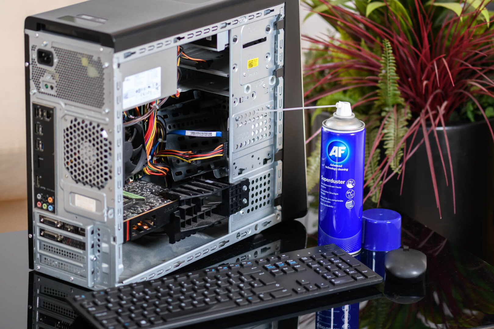 Computer cleaning with compressed air.