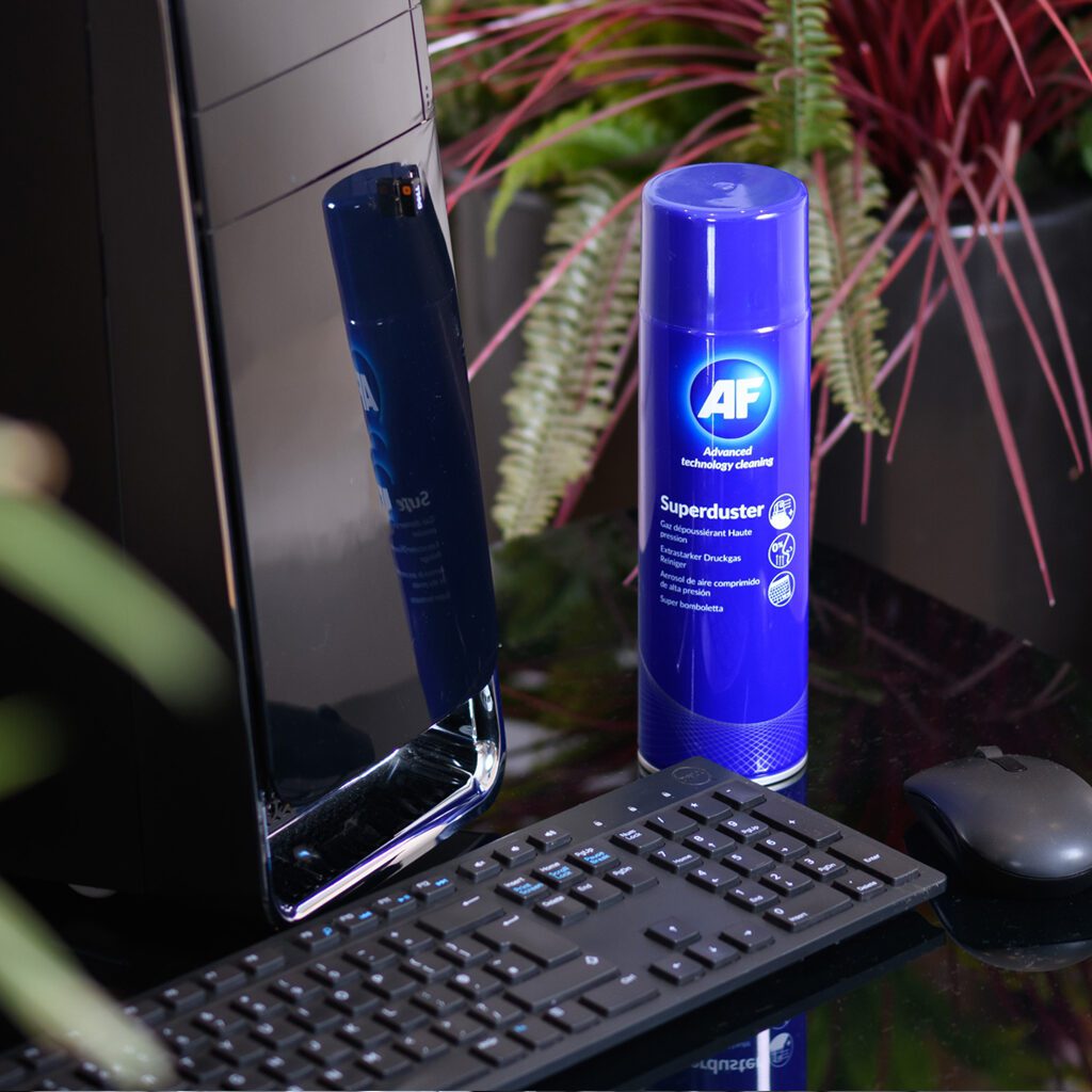 Computer cleaning kit with spray bottle.