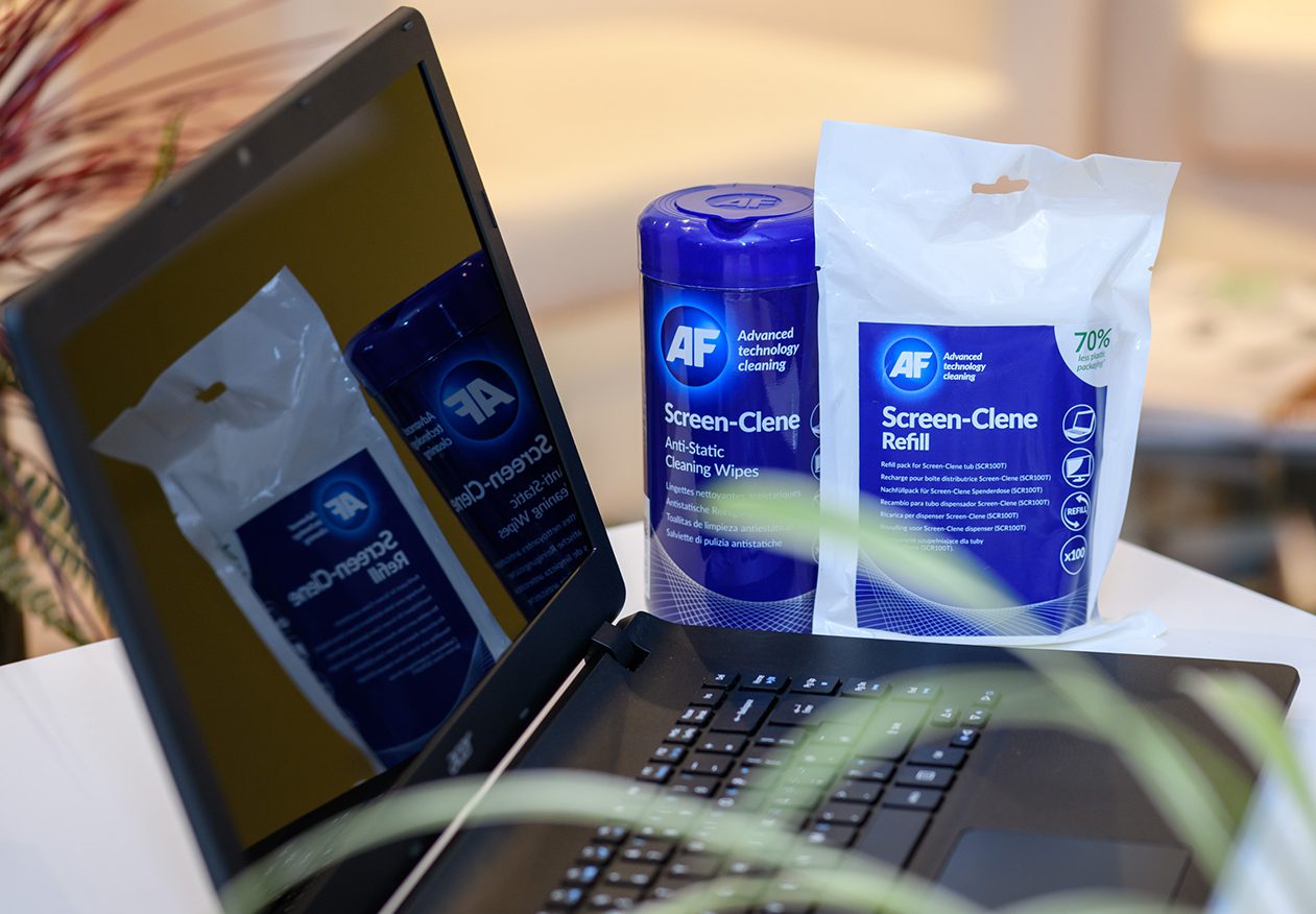 Laptop with screen cleaning wipes.