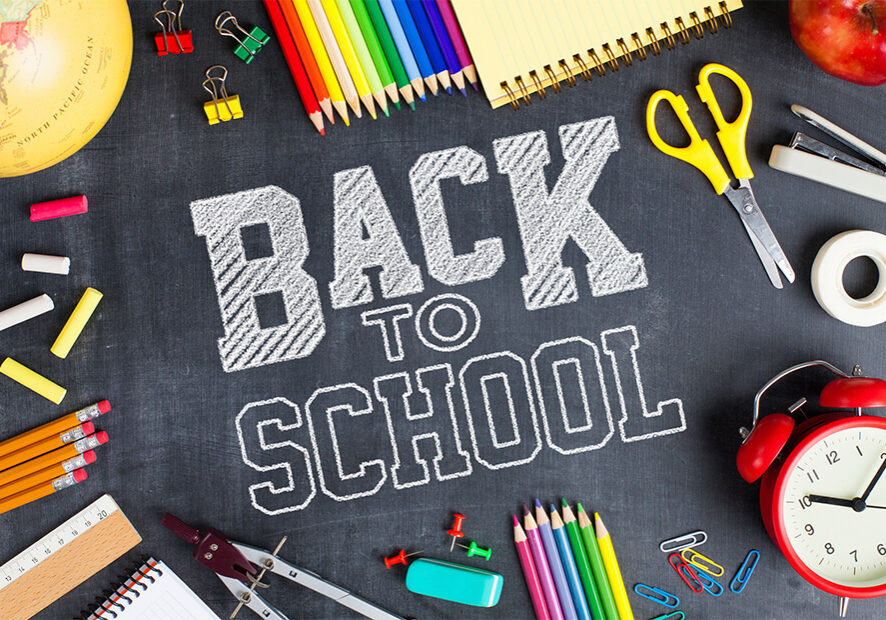 Chalkboard with "Back to School" supplies.